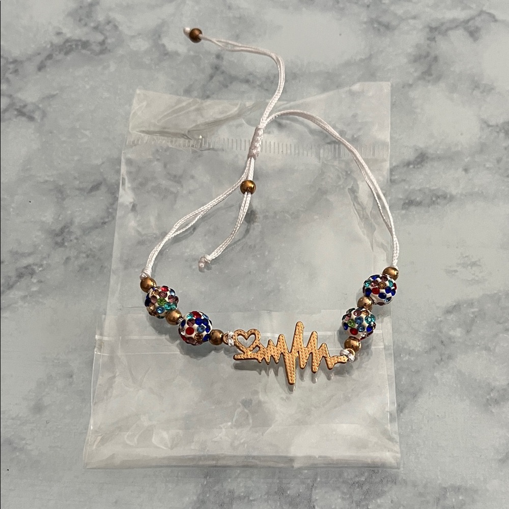 Gold Heartbeat Bracelet with Multicolor Beads